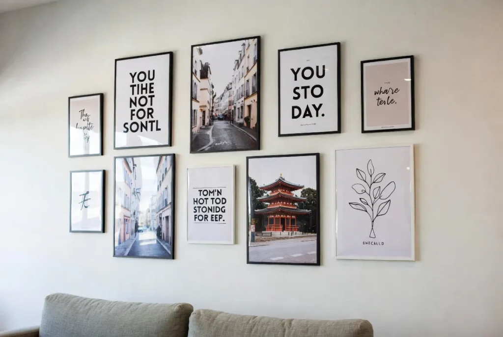 Apartment wall with framed posters